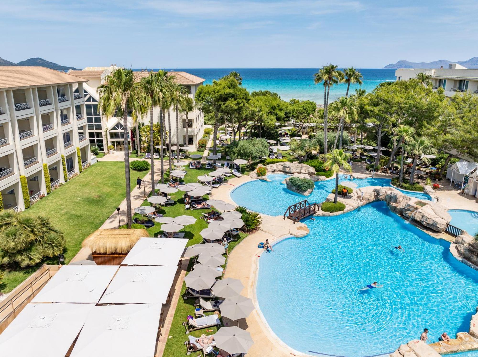 自然公园与水疗集团酒店 穆罗海滩 外观 照片 Hilton Mallorca Resort and Spa